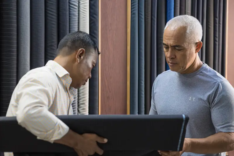 Tailor pressing the jacket collar, bespoke suit finishing, Patong (Ref 6307)