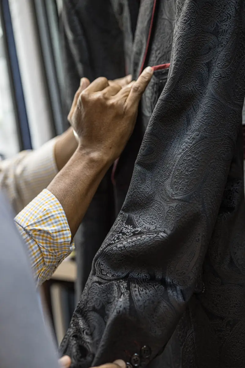 Pressing the trouser crease on a bespoke pair, Patong workshop (Ref 6333)