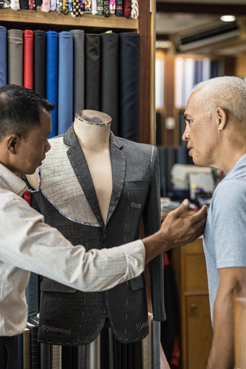 Assembling a jacket shell at our Patong workshop, David Jone Fashion (Ref 6337)