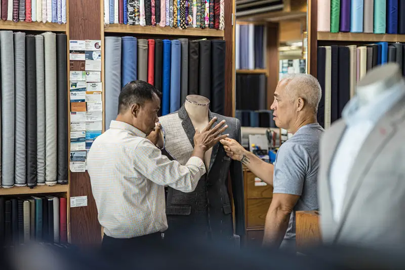 Seamstress finishing a custom shirt at David Jone Fashion (Ref 6347)