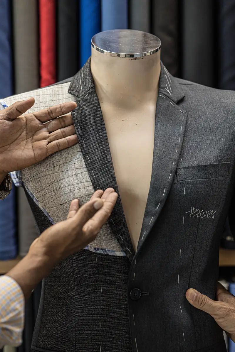 Pressing the trouser crease on a bespoke pair, Patong workshop (Ref 6351)