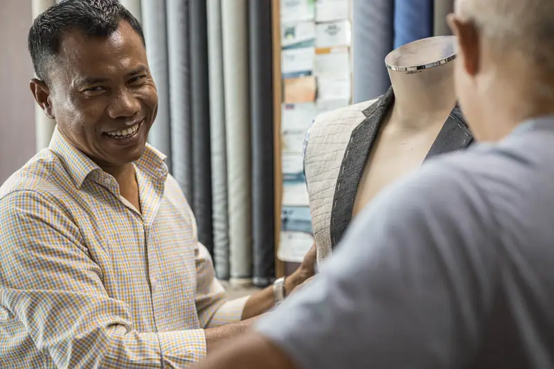 Assembling a jacket shell at our Patong workshop, David Jone Fashion (Ref 6355)