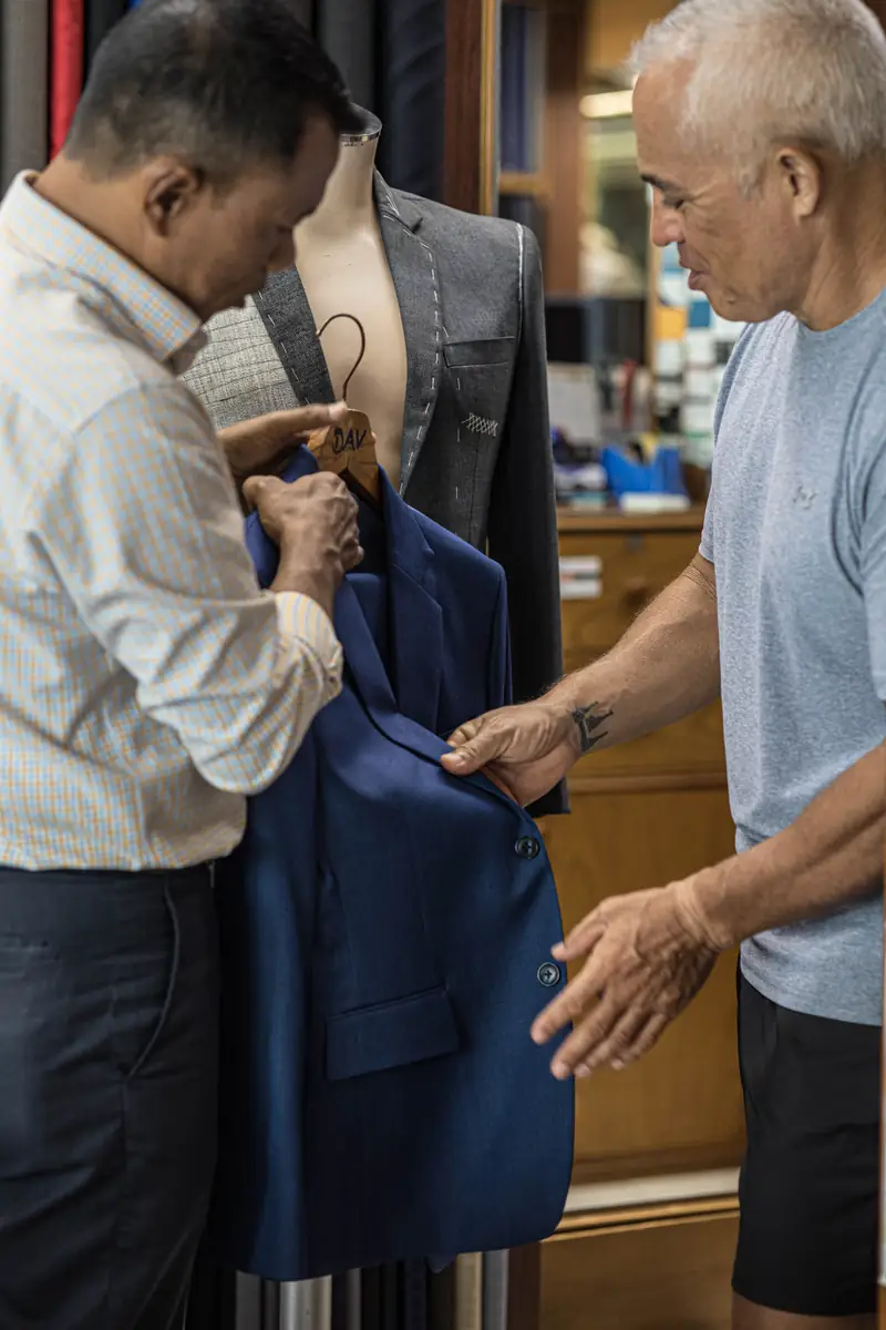 Pressing a bespoke jacket sleeve at David Jone Fashion, Phuket (Ref 6357)