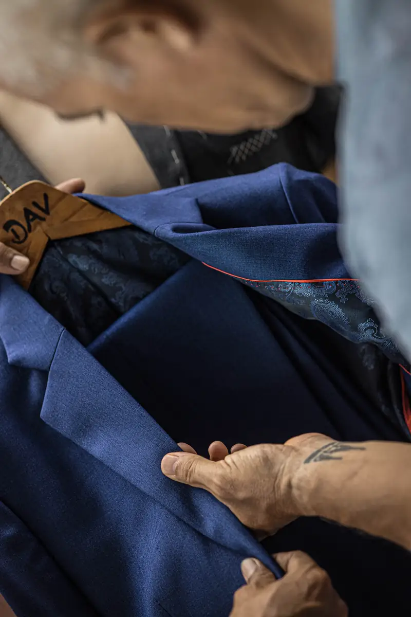 Hand-stitching the canvas on a bespoke jacket, David Jone Fashion (Ref 6359)