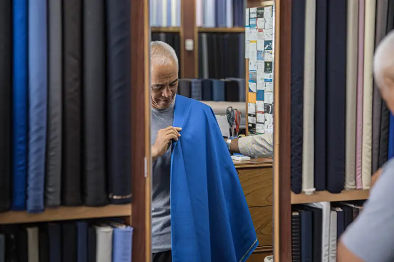 Pressing the trouser crease on a bespoke pair, Patong workshop (Ref 6388)