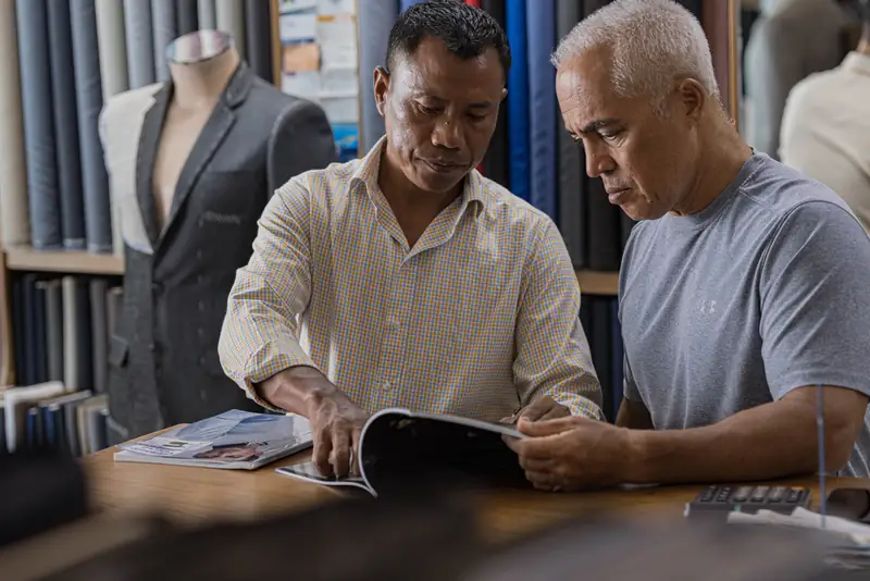 Fitting adjustment on a custom-tailored suit, Patong Phuket (Ref 6411)