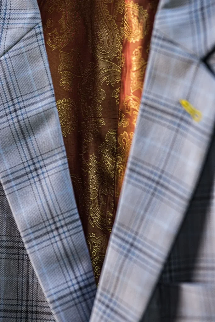 Checked jacket showing a contrasting orange lining